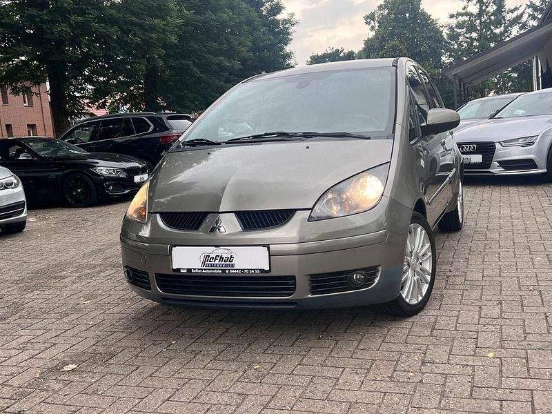 Grau Gebraucht 2009 Mitsubishi Colt Instyle Kleinwagen | 1.900 € - Bild 1/4