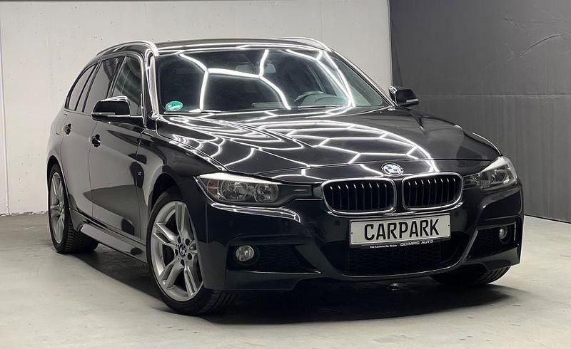 Schwarz Gebraucht 2014 BMW 318 Sport Line Kombi | 10.900 € (Fairer Preis) - Bild 1/4