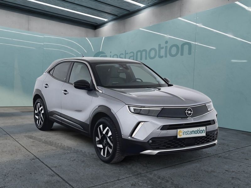 Grau Gebraucht 2022 Opel Mokka-e Elegance SUV | 20.580 € (Fairer Preis) - Bild 1/3
