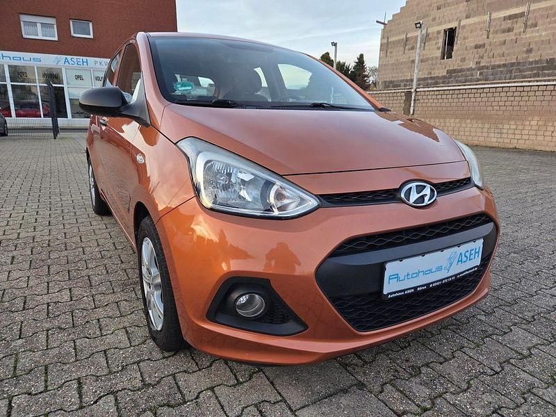 Orange Gebraucht 2014 Hyundai i10 Kleinwagen | 5.590 € (Fairer Preis) - Bild 1/4