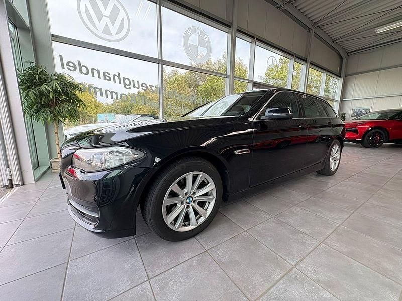 Gebraucht BMW 518 Sport Line 143 PS (105 kW) 2014 Black sapphire metallic Kombi