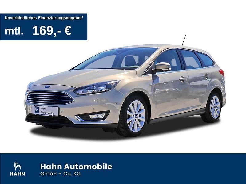Titangrau metallic Gebraucht 2015 Ford Focus Titanium Kombi | 14.930 € (Teuer) - Bild 1/3