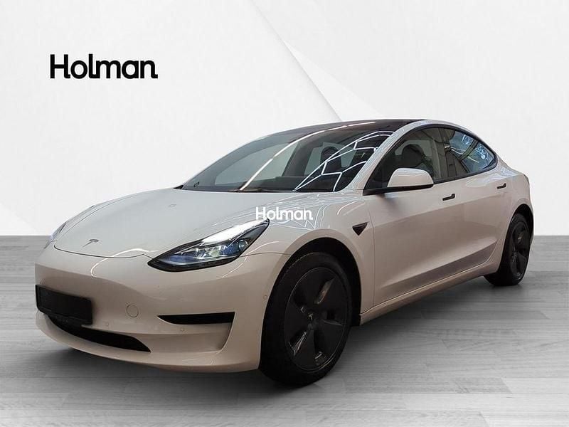 Weiß Gebraucht 2021 Tesla Model 3 Standard Range Plus Limousine | 25.630 € (Guter Preis) - Bild 1/4