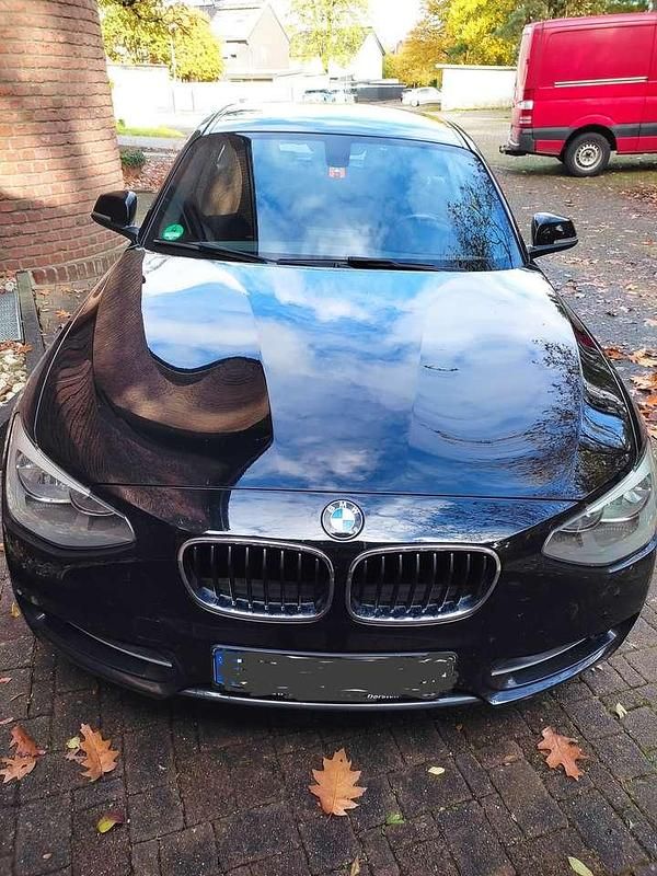 Schwarz Gebraucht 2013 BMW 116 Sport Line Kleinwagen | 7.700 € (Fairer Preis) - Bild 1/4