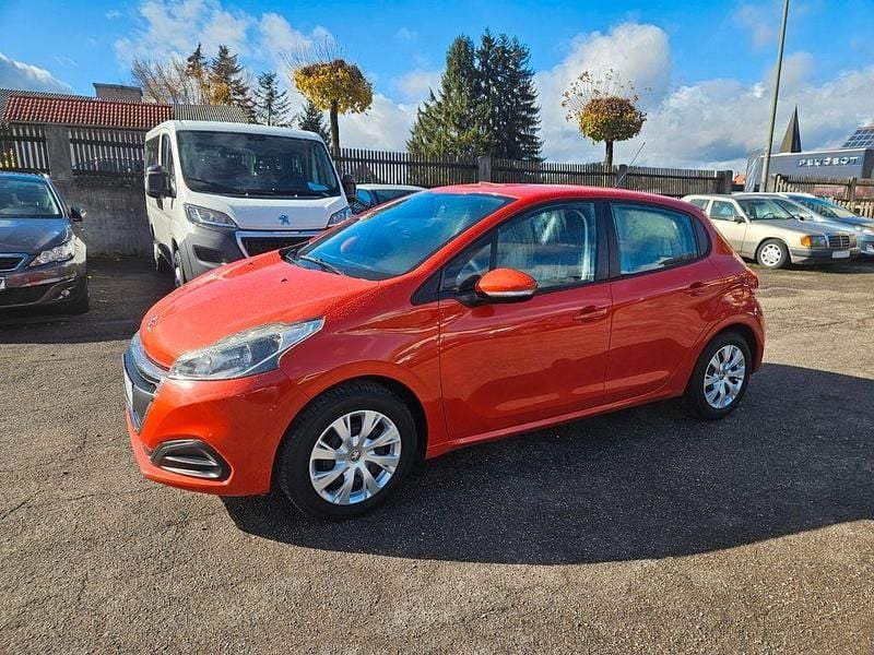 Gebraucht Peugeot 208 Active 82 PS (60 kW) 2015 Orange Kleinwagen