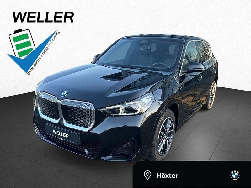 Black sapphire (schwarz) Gebraucht 2024 BMW iX1 Comfort Edition SUV | 38.880 € (Superpreis) - Bild 1/3