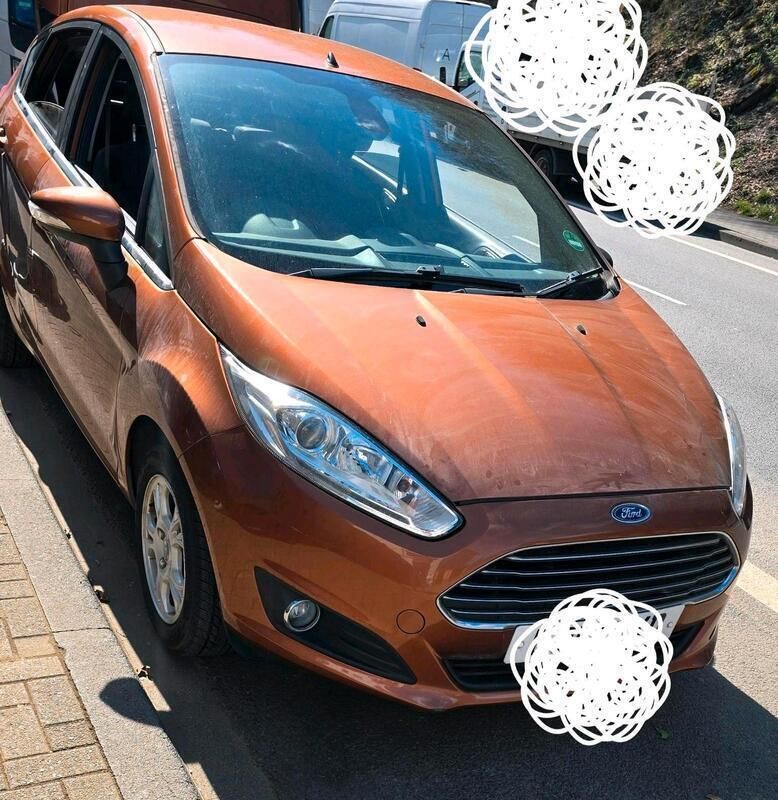 Orange Gebraucht 2013 Ford Fiesta Titanium Kleinwagen | 3.999 € - Bild 1/4