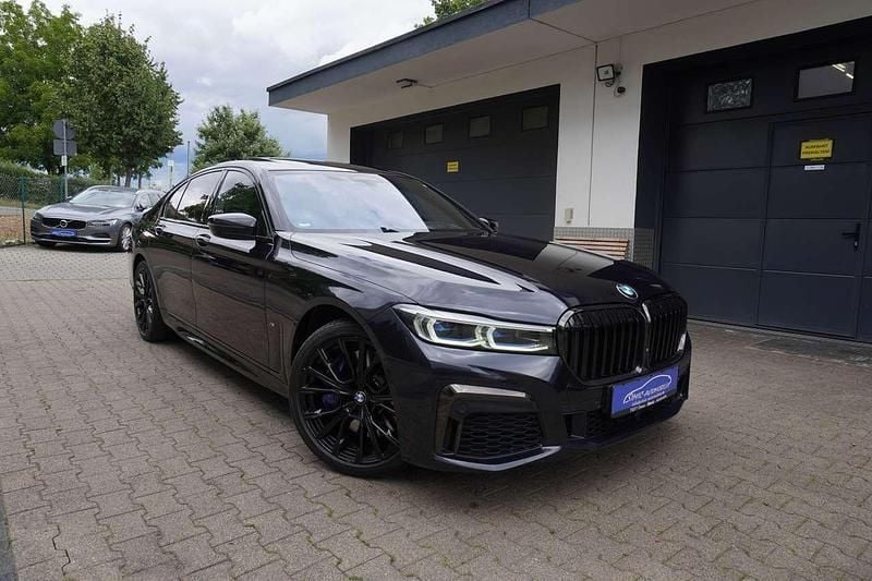 Carbonschwarz Gebraucht 2022 BMW 750 M Sport Limousine | 58.999 € (Guter Preis) - Bild 1/4