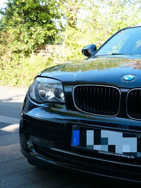 Second-hand BMW 116 122 CP (89 kW) 2009 Negru Hatchback