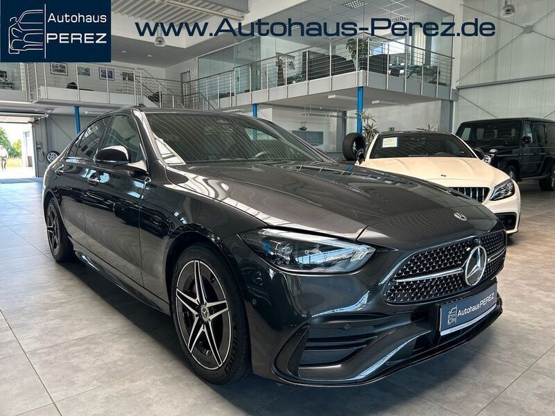 Grau Gebraucht 2024 Mercedes C300e Premium Limousine | 50.799 € (Fairer Preis) - Bild 1/4