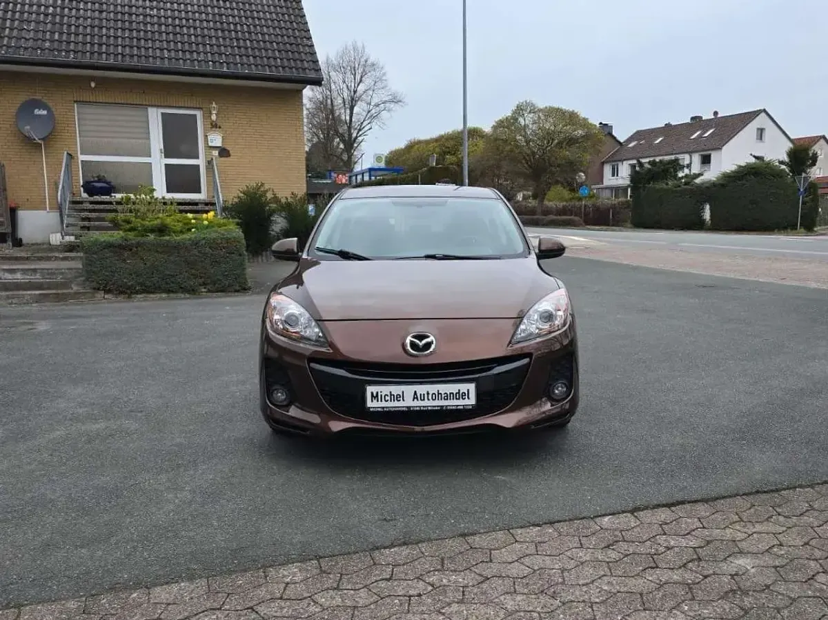 Używany Mazda 3 Edition 150 KM (110 kW) 2012 Brązowy Hatchback