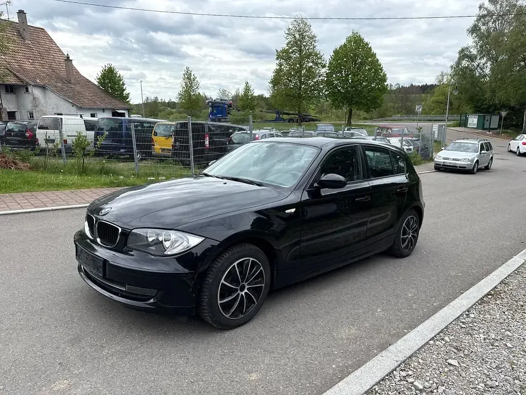 Second-hand BMW 116 122 CP (89 kW) 2009 Negru Hatchback