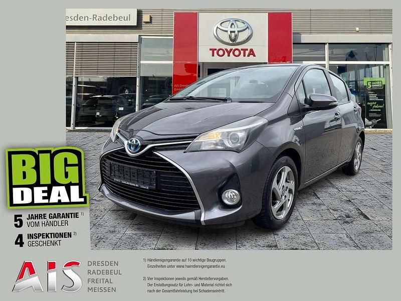 Grey metallic Gebraucht 2014 Toyota Yaris Hybrid Comfort Kleinwagen | 10.990 € (Fairer Preis) - Bild 1/3