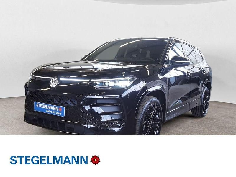 Grenadillschwarz metallic Neu 2025 VW Tayron R-line SUV | 65.830 € (Fairer Preis) - Bild 1/4