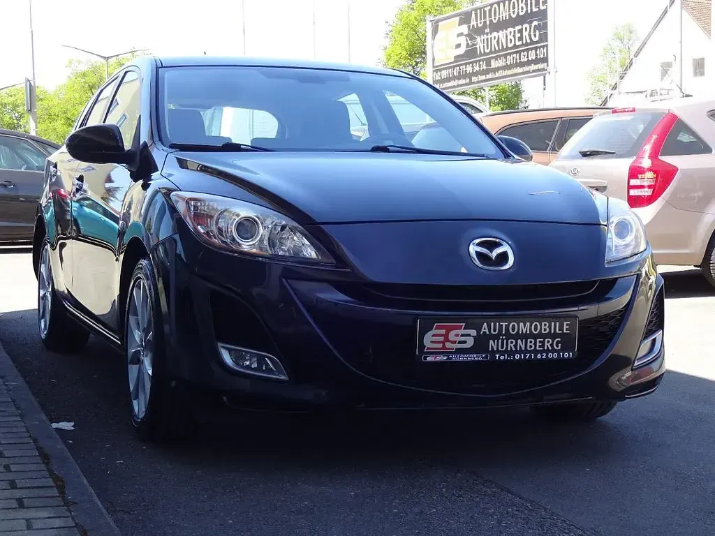 Używany Mazda 3 90th Anniversary 105 KM (77 kW) 2010 Czarny Sedan/Limuzyna