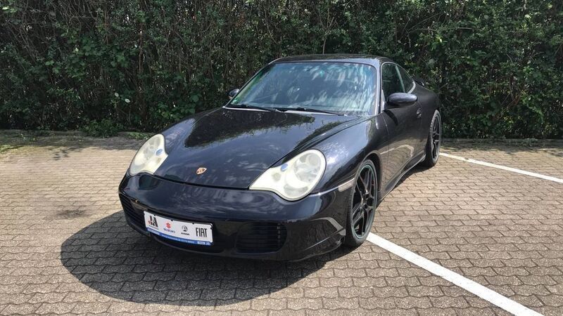 Basaltschwarzmetallic (metallic) Gebraucht 2004 Porsche 911 Carrera 4S Coupé | 44.900 € (Guter Preis) - Bild 1/4