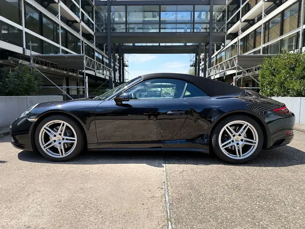 Gebraucht Porsche 911 Carrera Cabriolet 370 PS (272 kW) 2018 Tiefschwarz (metallic) Cabrio