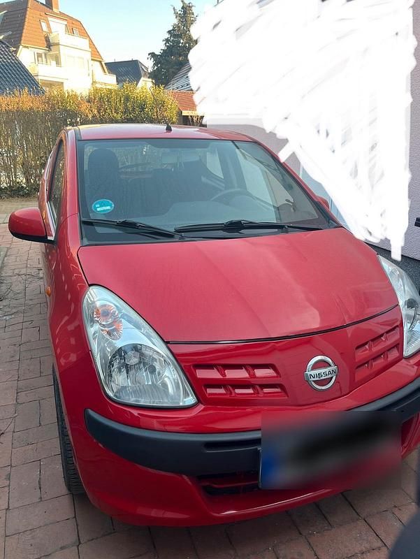 Gebraucht Nissan Pixo 68 PS (50 kW) 2009 Rot Kleinwagen
