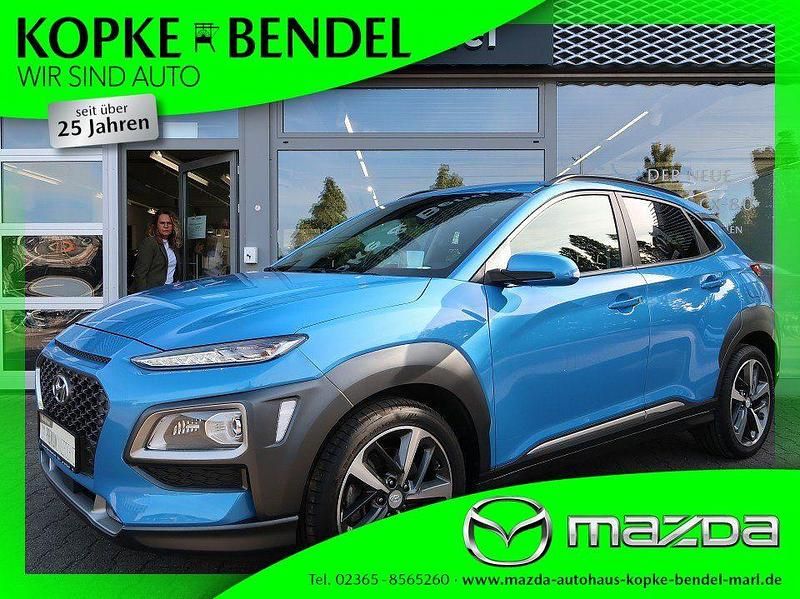 Blue lagoon metallic (metallic) Gebraucht 2018 Hyundai Kona Premium SUV | 18.550 € (Fairer Preis) - Bild 1/4