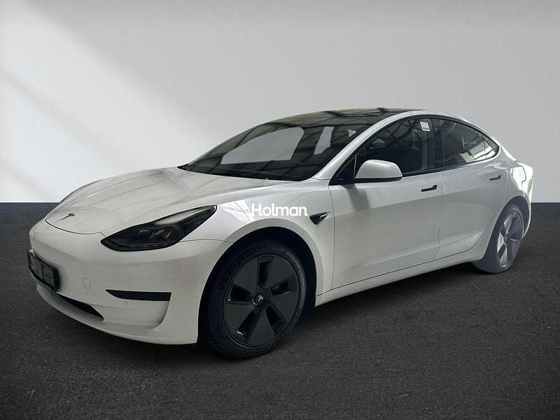 Weiß Gebraucht 2021 Tesla Model 3 Standard Range Plus Limousine | 25.692 € (Fairer Preis) - Bild 1/4