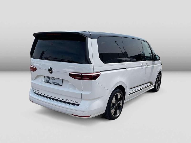 Gebraucht VW Multivan Edition 245 PS (180 kW) 2025 Candyweiß deep black perleffe Van