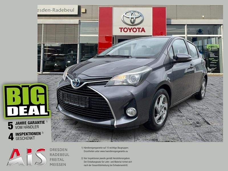 Grey metallic Gebraucht 2014 Toyota Yaris Hybrid Comfort Kleinwagen | 10.990 € (Fairer Preis) - Bild 1/3