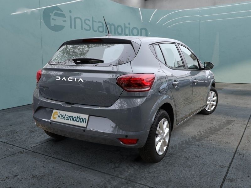 Grau Gebraucht 2023 Dacia Sandero Expression Kleinwagen | 15.833 € (Fairer Preis) - Bild 1/4