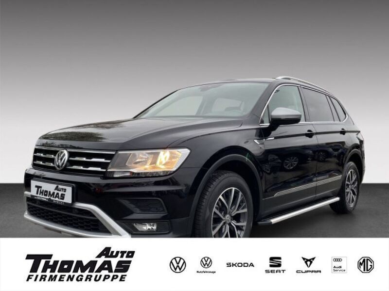 Deep black perleffekt (metallic) Gebraucht 2021 VW Tiguan Allspace Comfortline SUV | 28.666 € (Fairer Preis) - Bild 1/3