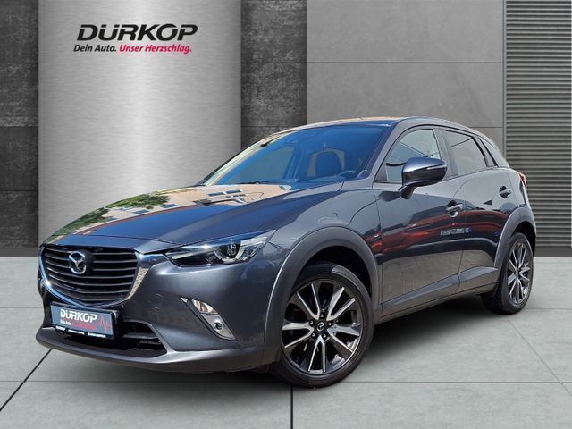 Graphitgrau metallic Gebraucht 2016 Mazda CX-3 Exclusive-Line SUV | 14.770 € (Etwas zu teuer) - Bild 1/4