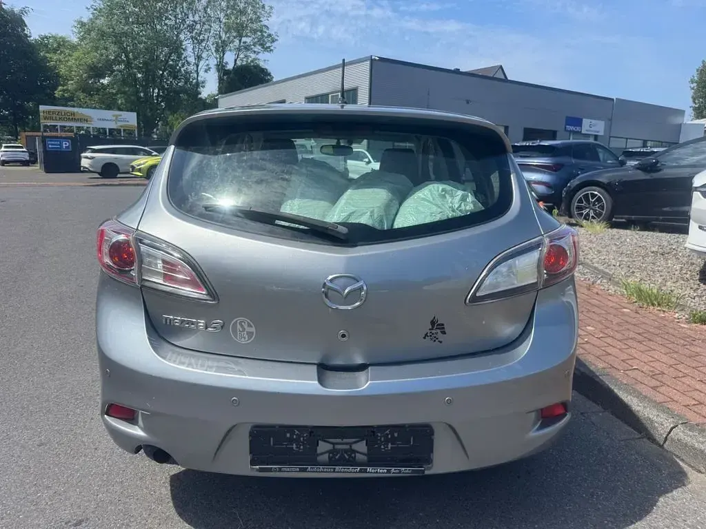 Używany Mazda 3 Center-Line 105 KM (77 kW) 2012 Szary Sedan/Limuzyna