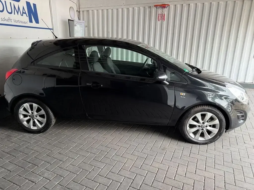 Gebraucht Opel Corsa Active 87 PS (63 kW) 2013 Schwarz Kleinwagen