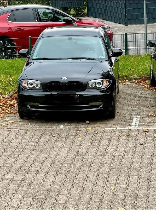 Gebraucht BMW 116 122 PS (89 kW) 2009 Schwarz Kleinwagen