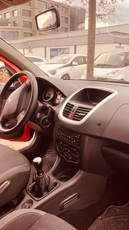 Gebraucht Peugeot 206 70 PS (51 kW) 2009 Rot Kleinwagen