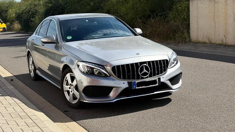 Grau Gebraucht 2014 Mercedes C180 AMG line Limousine | 13.250 € (Etwas zu teuer) - Bild 1/4