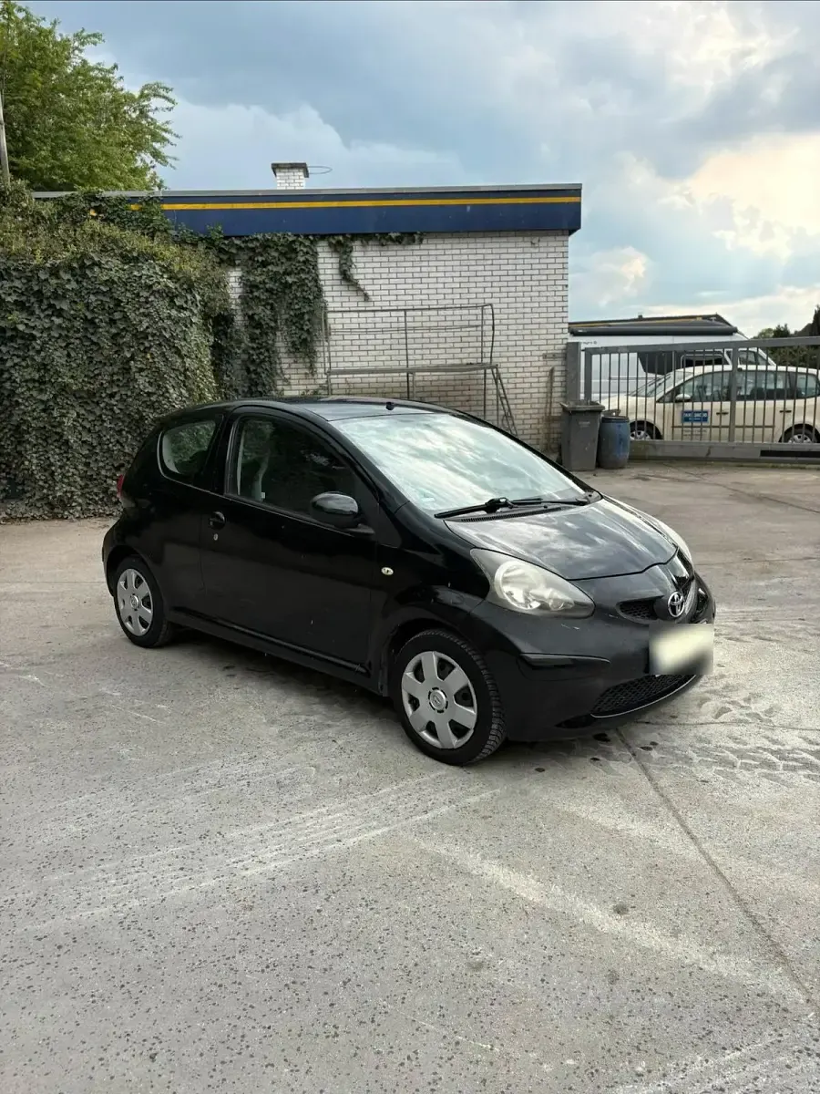 Gebraucht Toyota Aygo 68 PS (50 kW) 2007 Schwarz Kleinwagen