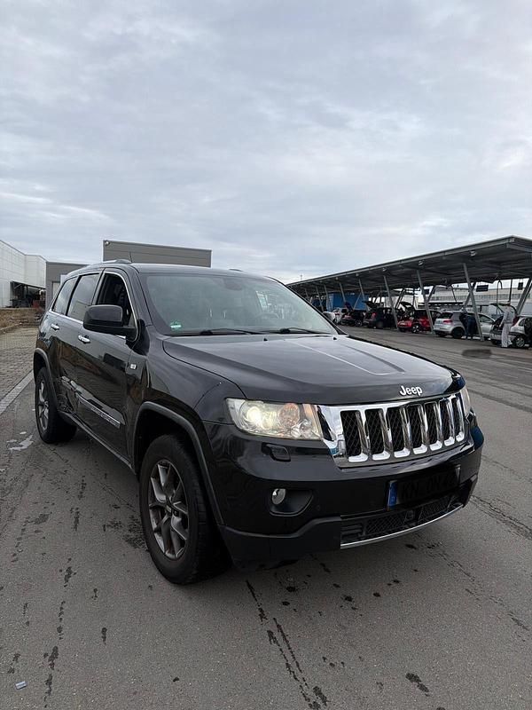 Gebraucht Jeep Grand Cherokee 300 PS (220 kW) 2011 Schwarz SUV