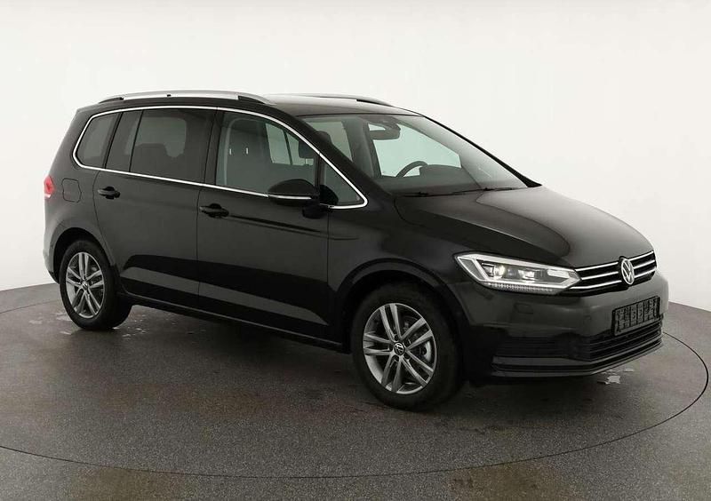 Grenadill black metallic Neu 2025 VW Touran Comfortline Van / Kleinbus | 38.595 € - Bild 1/4