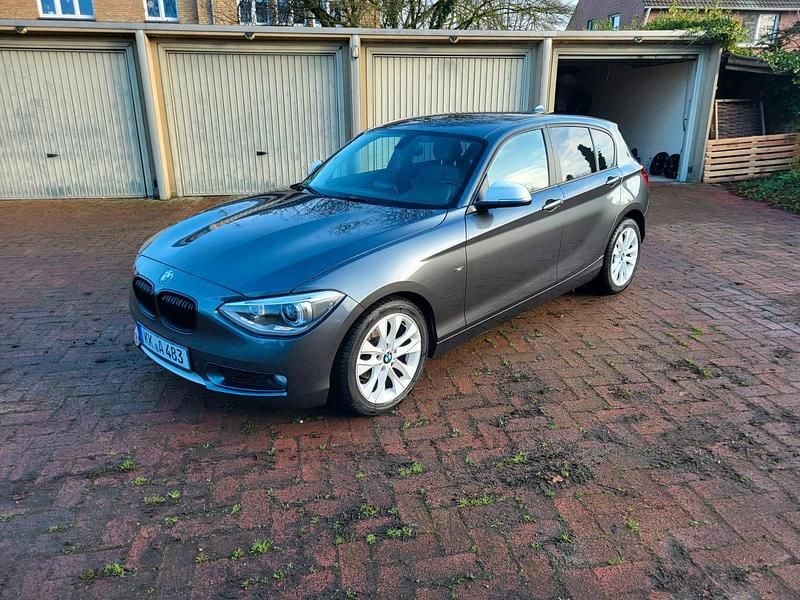 Grau Gebraucht 2013 BMW 116 Urban Line Kleinwagen | 8.400 € (Guter Preis) - Bild 1/4