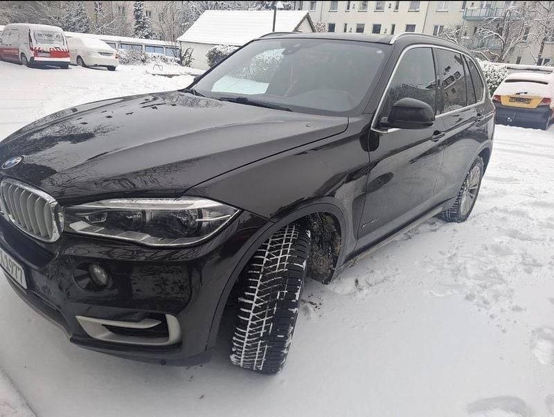 Braun Gebraucht 2015 BMW X5 Performance SUV | 17.900 € - Bild 1/4