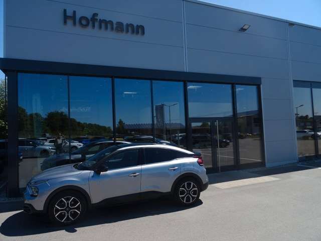 Grau Gebraucht 2021 Citroën e-C4 Shine Limousine | 16.950 € (Fairer Preis) - Bild 1/4