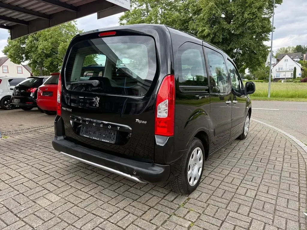 Gebraucht Peugeot Partner Tepee Tendance 90 PS (66 kW) 2010 Schwarz Van / Kleinbus