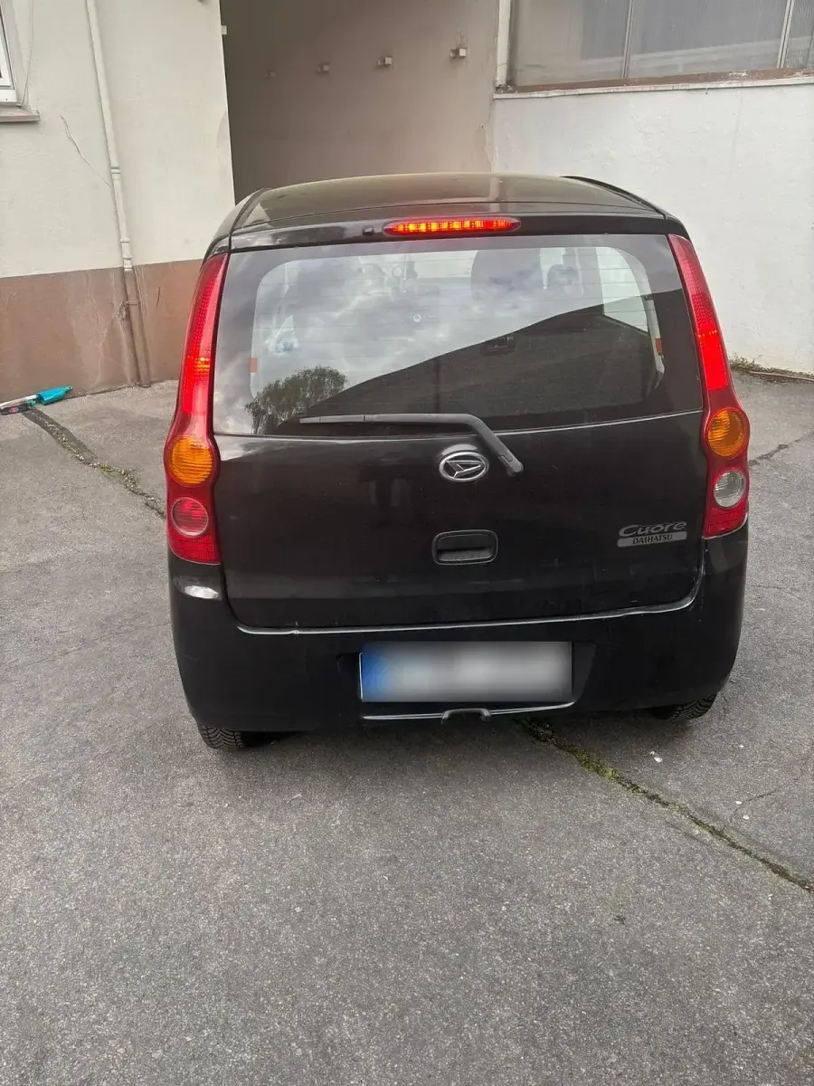 Gebraucht Daihatsu Cuore 70 PS (51 kW) 2009 Schwarz Kleinwagen