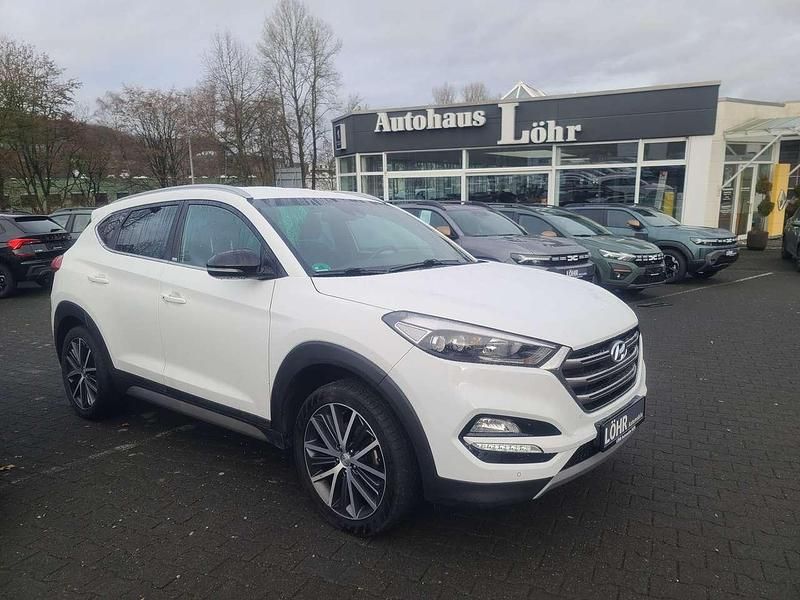Polar white / sol Gebraucht 2018 Hyundai Tucson Passion Plus SUV | 14.992 € (Fairer Preis) - Bild 1/4