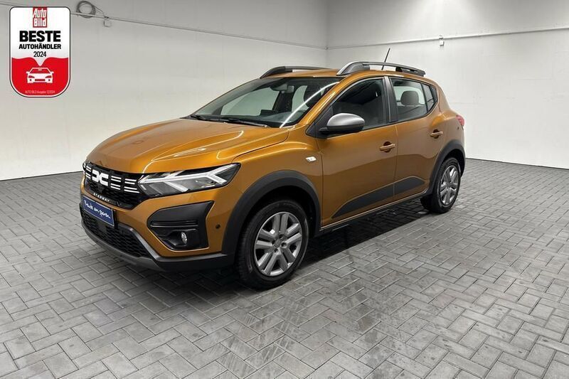 Gebraucht Dacia Sandero Expression 91 PS (66 kW) 2023 Orange (taklamakanorange met.) Kleinwagen