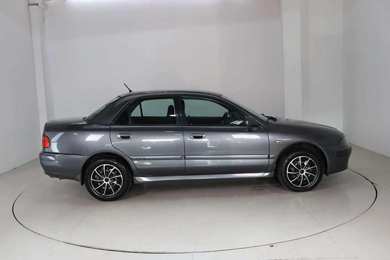 Gebraucht Mitsubishi Carisma 103 PS (75 kW) 2003 Grau Limousine