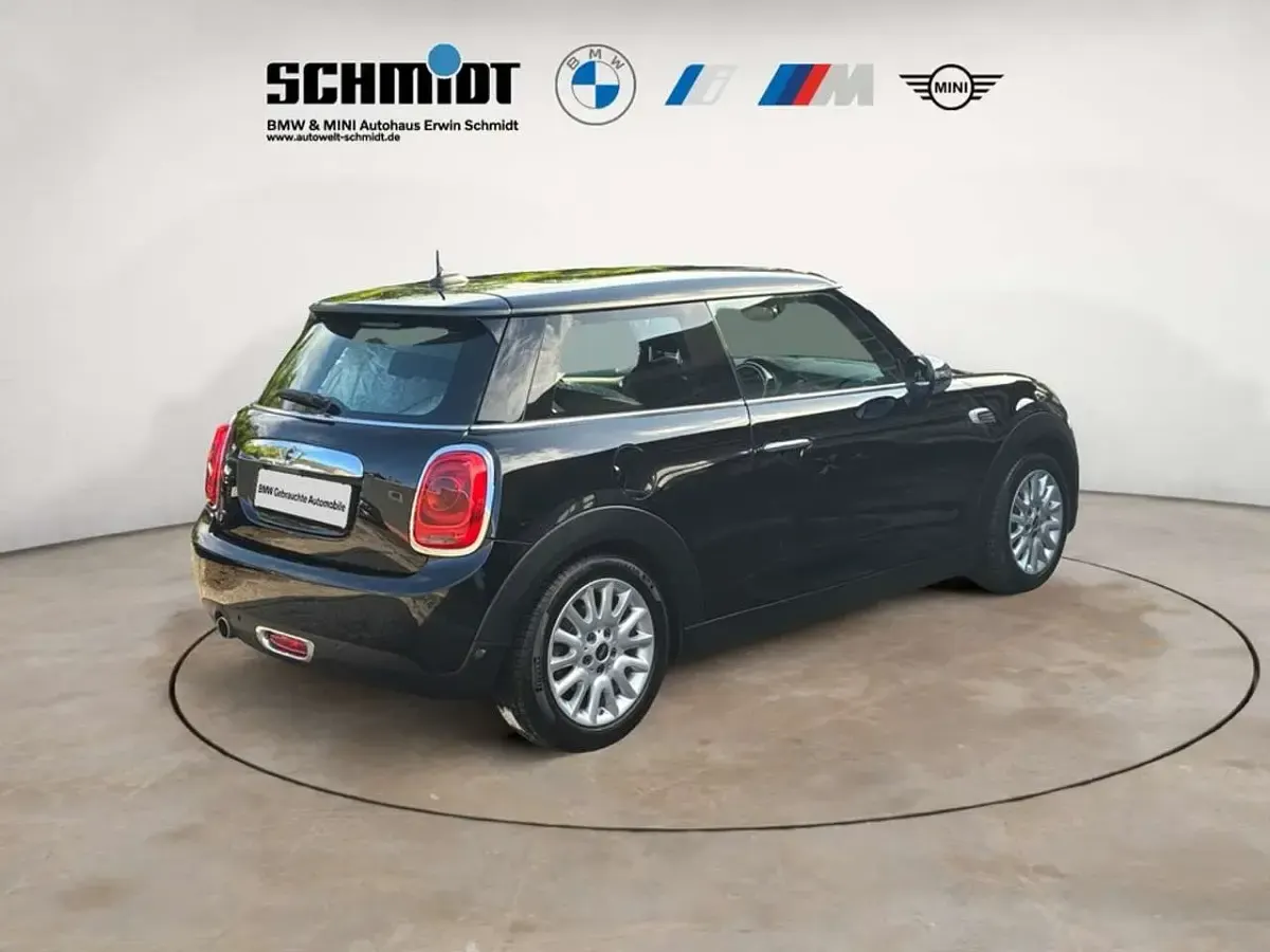 Gebraucht Mini Cooper D 116 PS (85 kW) 2014 Midnight black metallic Kleinwagen