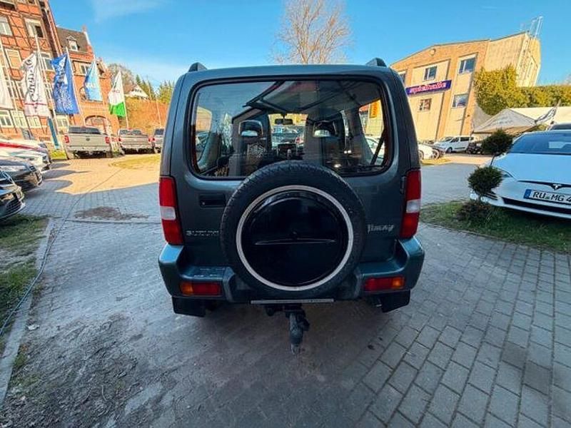 Usado Suzuki Jimny 86 HP (63 kW) 2005 Cinzento SUV