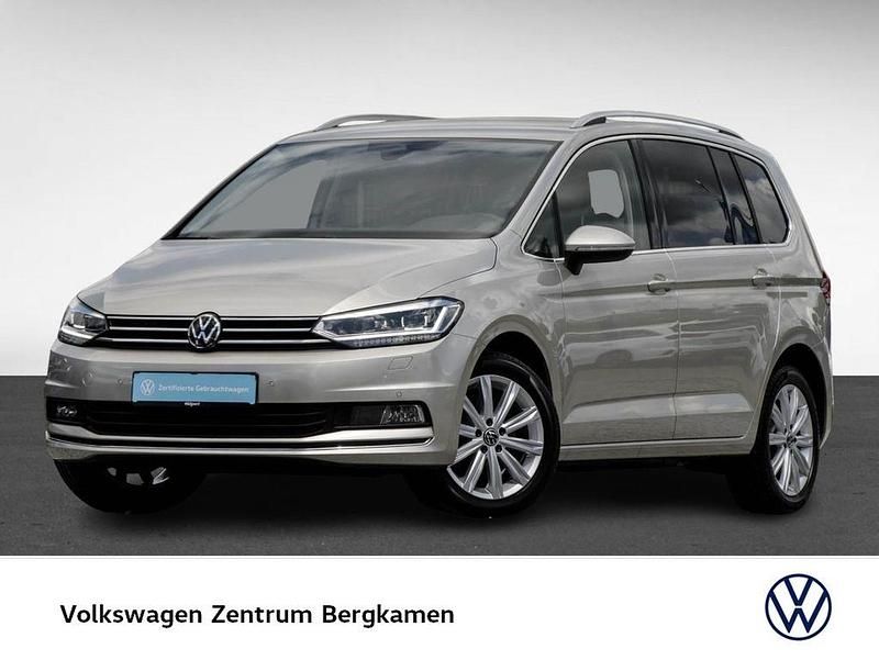 Ivory silver metallic Gebraucht 2024 VW Touran Highline Van / Kleinbus | 32.555 € (Guter Preis) - Bild 1/4