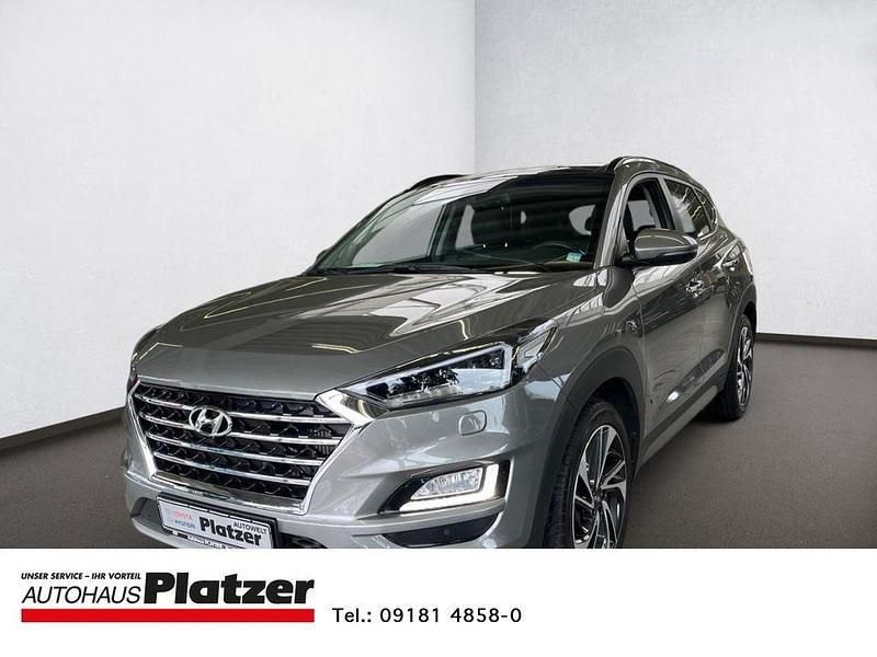 Grau Gebraucht 2019 Hyundai Tucson Premium SUV | 21.950 € (Etwas zu teuer) - Bild 1/4