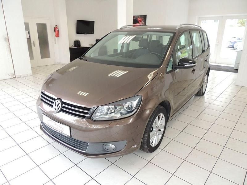 Braun Gebraucht 2012 VW Touran Style Van / Kleinbus | 6.999 € (Fairer Preis) - Bild 1/4
